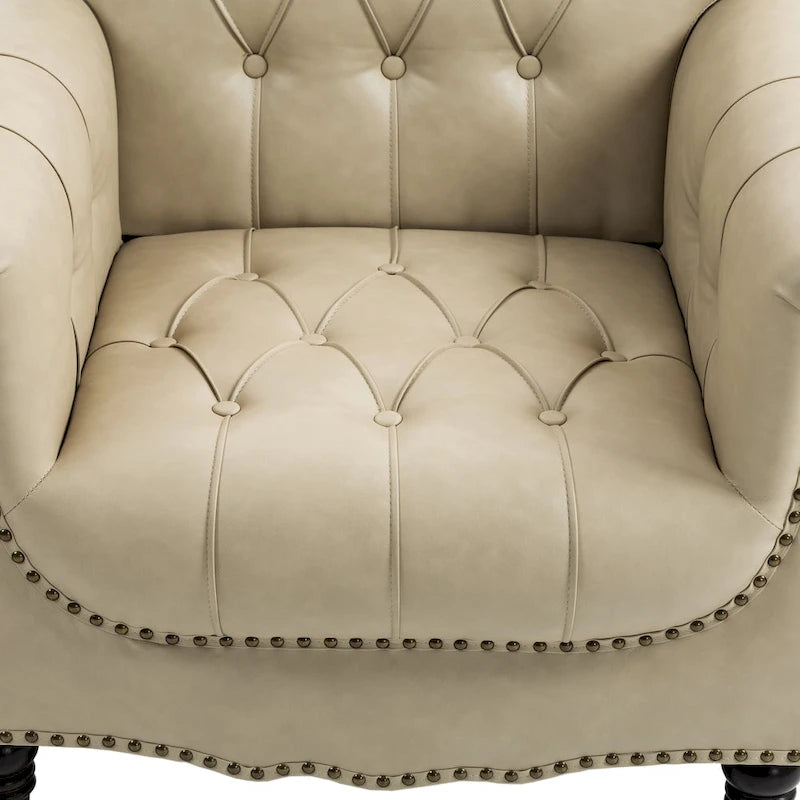 Fauteuil d'appoint capitonné en similicuir avec clous décoratifs